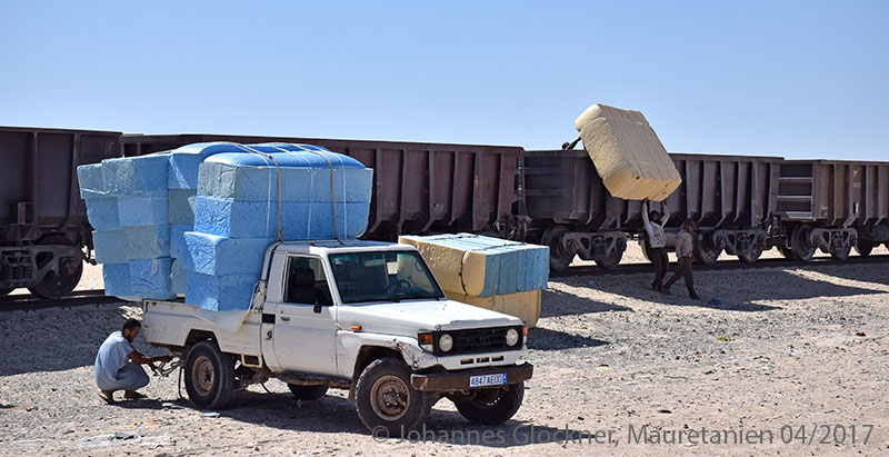 Desert railway in Mauritania loading goods